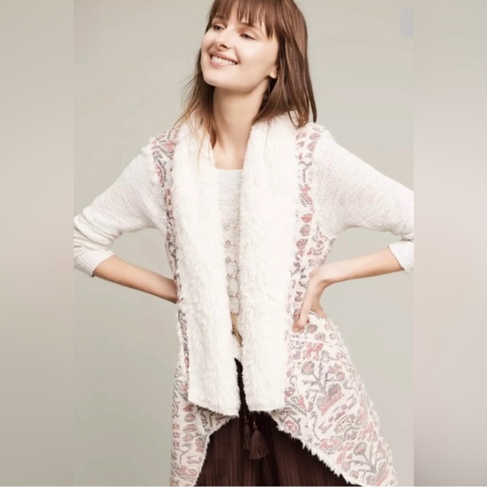 Super warm, comfy vest from anthropology! Cute with any outfit.
